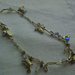 Someone hand me pinacoloda Panama Jack dolphin bracelet